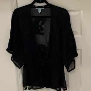 Chic Black Blouse with Elegant Design